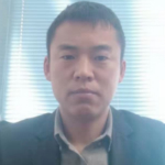 束先生